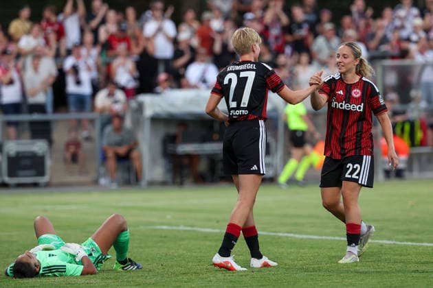 Frankfurt am Main, Germany, August 2026: Goalkeeper Constantina Kouzali of Omonia Nicosia, Paulina Krumbiegel of Eintracht Frankfurt is seen celebrating after scoring a goal to make the score 8–0, and Danique Tolhoek of Eintracht Frankfurt during the second qualifying round match between Eintracht Frankfurt and Omonia Nicosia in the semifinals of the UEFA Women’s LP Mini Tournament at Stadium am Bretanobad in Frankfurt am Main, Germany Copyright: HMBxMedia JoaquimxFerreira