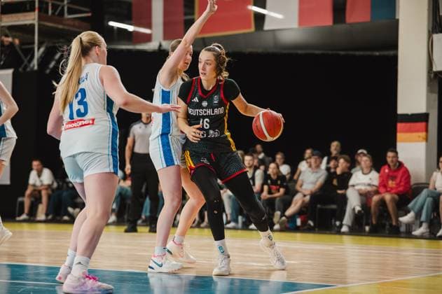 Lilli Schultze, 16, of Germany uses her body to drive past a Finnish defender. In the background, spectators watch the game at Kistamässan in Stockholm. Lilli Schultze, 16, of Germany dribbles past the Finnish defense. Copyright: xJoelxKruehlerx