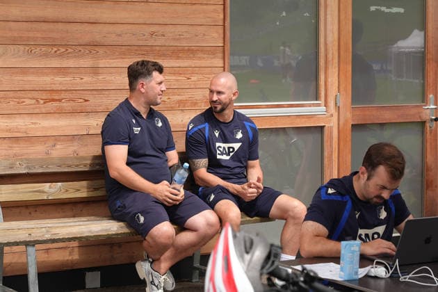 August 6, 2026, Seefeld Stadium, Seefeld, TSG Hoffenheim s 2026 training camp in Seefeld, Hoffenheim s sporting director Andreas Schicker in conversation with coach Christian Ilzer. Photo by Hasan Bratic, DeFodi Images