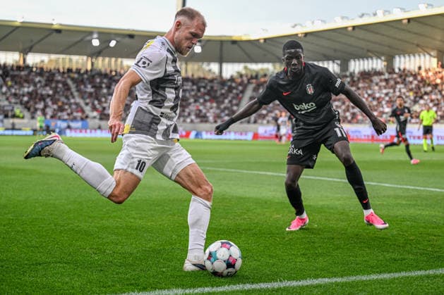 From left Mick van Buren of Hradec Kralove and Kassoum Ouattara of Besiktas in action during the Football European League 3rd qualifying round, 1st leg match FC Hradec Kralove vs Besiktas Istanbul on August 6, 2026, in Hradec Kralove, Czech Republic. (CTKxPhoto DavidxTanecek) CTKPhotoP2026080606613  CTKPhotoP2026080606613