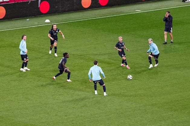 Soccer Austria UEFA Europa League Qualifiers 2026–2027, Round 3, August 6, 2026: FC Red Bull Salzburg (Austria) vs. Pafos FC (Cyprus) at Red Bull Arena, Wals-Siezenheim, Austria. Pafos players warm up after the game was interrupted. Copyright: xLUKAxKOLANOVICx