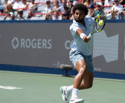 August 6, 2026, Montreal, Pq, Canada: Arthur Fils of France hits a return to Mariano Navone of Argentina during third round tennis action at the National Bank Open in Montreal on Thursday, Aug. 6, 2026. Canada News - August 6, 2026  - ZUMAc35_ 20260806_zaf_c35_021 Copyright: xChristinnexMuschix