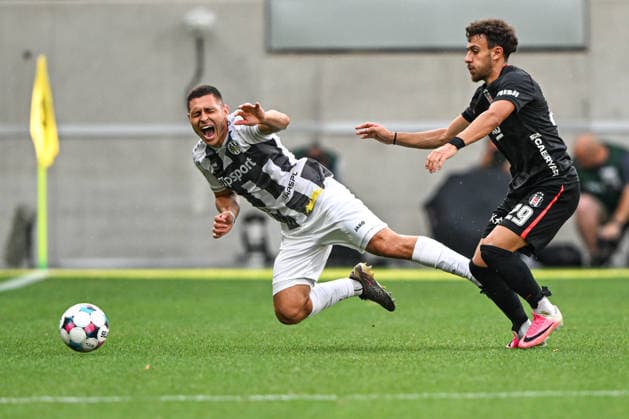 From left Jakub Kucera of Hradec Kralove and Ilhan Fakili of Besiktas in action during the Football European League 3rd qualifying round, 1st leg match FC Hradec Kralove vs Besiktas Istanbul on August 6, 2026, in Hradec Kralove, Czech Republic. (CTKxPhoto DavidxTanecek) CTKPhotoP2026080607364  CTKPhotoP2026080607364