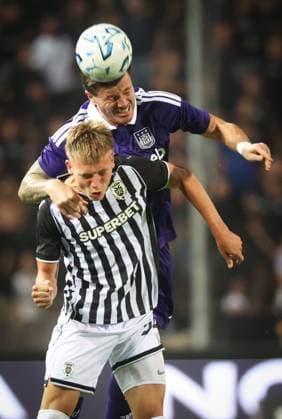 PAOK s Anestis Mythou and Anderlecht s Giulian Biancone fight for the ball during a game between Belgian first division soccer team RSC Anderlecht and Greek club Paok, in Thessaloniki, Greece, on Thursday 06 August 2026. This is the first leg of a third qualifying round of the UEFA Europa League competition. VIRGINIExLEFOUR  x182862589x