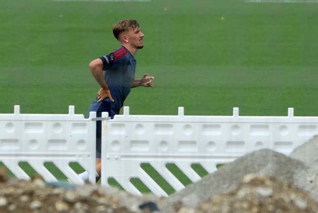 August 6, 2026, FC Bayern Munich Training, Soccer, Sports; Pictured: Lennart Karl of FC Bayern Munich jogging and rubbing his back