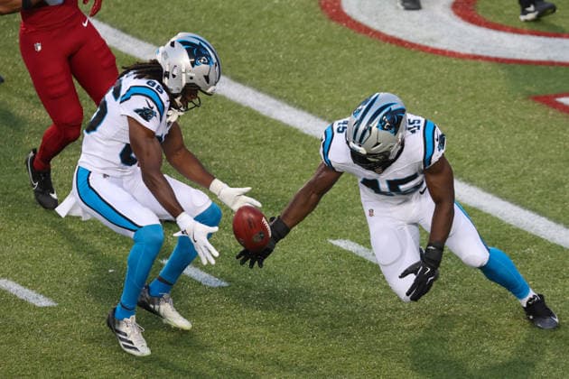 CANTON, OH - AUGUST 06: Carolina Panthers wide receiver Ja seem Reed (86) downs a punt with the assistance of Carolina Panthers linebacker Maema Njongmeta (45) during the first quarter of the National Football League preseason game between the Carolina Panthers and Arizona Cardinals on August 6, 2026, at the Tom Benson Hall of Fame Stadium in Canton, OH. (Photo by Frank Jansky Icon Sportswire) NFL, American Football Herren, USA AUG 06 Hall of Fame Game - Panthers vs Cardinals EDITORIAL USE ONLY Icon26080643