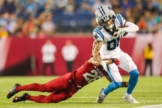 August 6, 2026, Canton, Ohio, USA: Carolina Panthers wide receiver CASEY WASHINGTON (88) is tackled by Arizona Cardinals cornerback ELIJAH JONES (28) at the 2026 Pro Football Hall of Fame Game between the Carolina Panthers and Arizona Cardinals at Tom Benson Hall of Fame Stadium on August 6, 2026 in Canton, Ohio. NFL, American Football Herren, USA 2026: Hall Of Fame Game - Carolina Panthers Vs. Arizona Cardinals - NFL Preseason 2026  - ZUMAs335 20260806_znp_s335_035 Copyright: xMatthewxSmithx