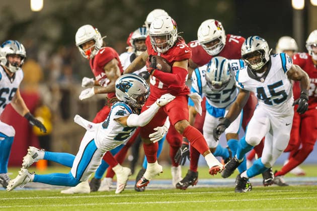 August 6, 2026, Canton, Ohio, USA: Arizona Cardinals player attempts to escape Carolina Panthers defense at the 2026 Pro Football Hall of Fame Game between the Carolina Panthers and Arizona Cardinals at Tom Benson Hall of Fame Stadium on August 6, 2026 in Canton, Ohio. NFL, American Football Herren, USA 2026: Hall Of Fame Game - Carolina Panthers Vs. Arizona Cardinals - NFL Preseason 2026  - ZUMAs335 20260806_znp_s335_037 Copyright: xMatthewxSmithx