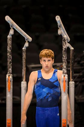 Gymnastics: Gymnastics: Xfinity US Gymnastics Championships Abe Stewart of Momentum competes on parrellel bars exercise in the junior division of the Xfinity USA Gymnastics Championship at the Mortgage Matchup Center in Phoenix, Arizona, Thursday, August 6, 2026. (Thomas Fernandez Image of . Phoenix Arizona United States EDITORIAL USE ONLY Copyright: xx ThomasxFernandezx iosphotos417356