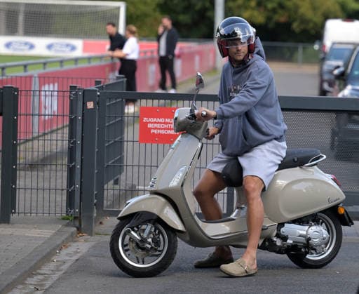 August 7, 2026, xophax, Soccer, Bundesliga 1, 1. FC Köln Training on Field 1 at Geissbockheim; the pros train ahead of the evening match against Real San Sebastian; Joel Schmied of 1. FC Köln rides his Vespa scooter to training in Kitzbühel