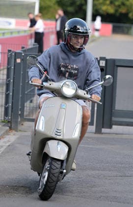 August 7, 2026, xophax, Soccer, Bundesliga 1, 1. FC Köln Training on Field 1 at Geissbockheim; the pros train ahead of the evening match against Real San Sebastian; Joel Schmied of 1. FC Köln rides his Vespa scooter to training in Kitzbühel