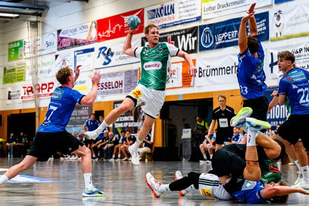August 7, 2026, xdobgx, 2026 Heide Cup Handball Tournament, TSV Hannover Burgdorf vs. Mors Thy Handball; from left: Simon Skovhus Jensen (Mors Thy Handbold), 27; Marian Michalczik (TSV Hannover Burgdorf), 22, shooting; in action; Kasper Didriksen (Mors Thy Handbold), 33