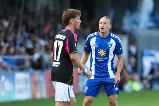 August 7, 2026, Soccer, Men s, Regionalliga Nord, Matchday 2, BSV Kickers Emden vs. Hamburger SV II, Matti Tjaden (blue, 11) of BSV Kickers Emden in a tackle with Dorian Migalic (17) of Hamburger SV II