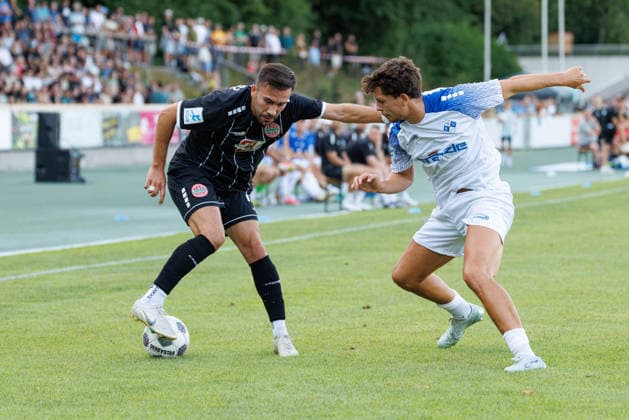 Furkan Kircicek, 19, of TSV Landsberg, and Jordi Wegmann, 19, of FV Illertissen 1921, during the match between TSV Landsberg and FV Illertissen 1921, soccer, men’s, Bavarian Regional League, 2026–2027, Matchday 3 on August 7, 2026, in Landsberg am Lech, Sportpark, Bavaria, Germany