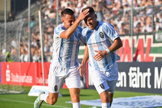 Goal celebration by Florian NIEDERLECHNER of TSV 1860 Munich with Raphael WACH of TSV 1860 Munich after the goal that made it 2–0; cheering, joy,excitement, action—Bavarian Regional League soccer, 2026–2027 season, Matchday 26–27, Game 3: TSV 1860 Munich vs. FC Augsburg II on August 7, 2026, at Grünwalder Stadion in Munich