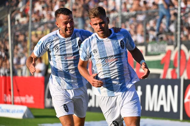 Goal celebration by Florian NIEDERLECHNER of TSV 1860 Munich with Raphael WACH of TSV 1860 Munich after the goal that made it 2–0; cheering, joy,excitement, action—Bavarian Regional League soccer, 2026–2027 season, Matchday 26–27, Game 3: TSV 1860 Munich vs. FC Augsburg II on August 7, 2026, at Grünwalder Stadion in Munich