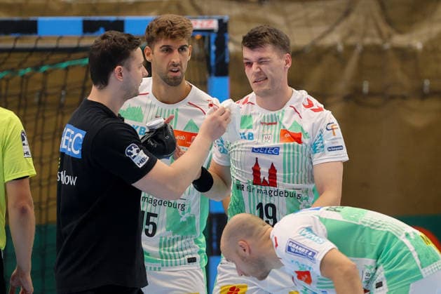 August 7, 2026, xtgx, Handball Tournament, EHV Aue vs. SC Magdeburg emspor, from left: Elvar Orn Jonsson (Magdeburg), 19 injured, injury, Auge Lößnitz