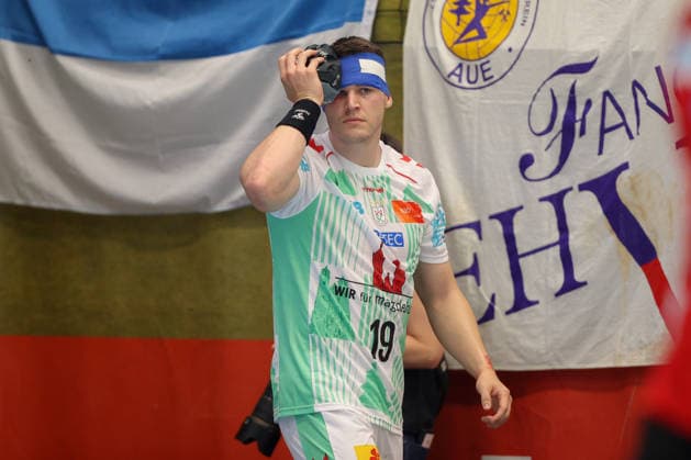 August 7, 2026, xtgx, Handball Tournament, EHV Aue vs. SC Magdeburg emspor, from left: Elvar Orn Jonsson (Magdeburg), 19 injured, injury, Auge Lößnitz