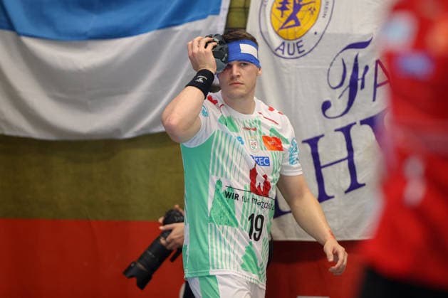 August 7, 2026, xtgx, Handball Tournament, EHV Aue vs. SC Magdeburg emspor, from left: Elvar Orn Jonsson (Magdeburg), 19 injured, injury, Auge Lößnitz