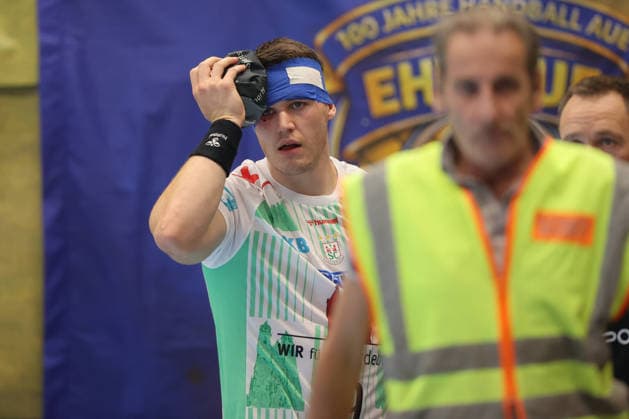 August 7, 2026, xtgx, Handball Tournament, EHV Aue vs. SC Magdeburg emspor, from left: Elvar Orn Jonsson (Magdeburg), 19 injured, injury, Auge Lößnitz