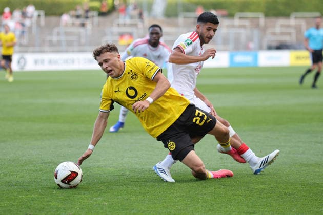 August 7, 2026, xsefx, Soccer, Borussia Dortmund II U23 vs. 1. FC Köln II U21, Regionalliga West, Rote Erde Stadium, Matchday 2, 2026–2027 Season: Malik Hodroj (BVB II, No. 23) in a tackle against Kian Hekmat (1. FC Köln II, No. 18). DFB regulations prohibit any use of photographs as image sequences and or quasi-video. North Rhine-Westphalia, Germany