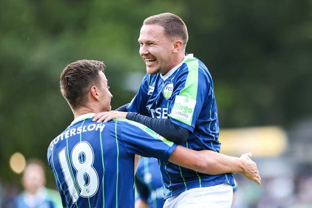 August 7, 2026, xkwix, Soccer, Regionalliga West, FC Gütersloh vs. VfL Bochum II, Heidewaldstadion, Matchday 2, 2026–2027 season: 1–0 goal by Patrik Twardzik (FC Gütersloh, age 18) celebrating with Phil Beckhoff (FC Gütersloh, age 8). DFB regulations prohibit any use of photographs as image sequences and or quasi-video. Photo: xKamilxWilkowskixPressefotoKochx North Rhine-Westphalia, Germany