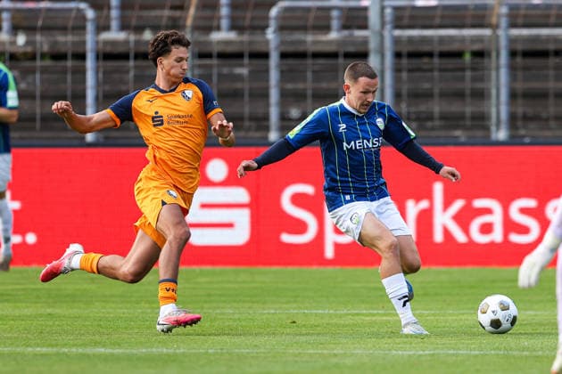 August 7, 2026, xkwix, Soccer, Regionalliga West, FC Gütersloh vs. VfL Bochum II, Heidewaldstadion, Matchday 2, 2026–2027 Season: Luca Leon Bernsdorf of VfL Bochum II 2 in a tackle against Phil Beckhoff of FC Gütersloh 8. DFB regulations prohibit any use of photographs as image sequences and or quasi-video. Photo: xKamilxWilkowskixPressefotoKochx, North Rhine-Westphalia, Germany