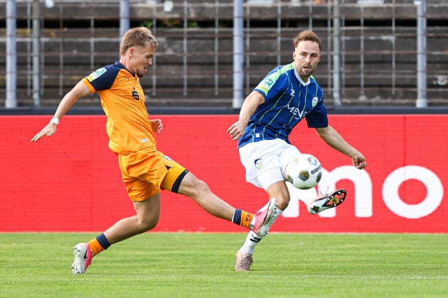 August 7, 2026, xkwix, Soccer, Regionalliga West, FC Gütersloh vs. VfL Bochum II, Heidewaldstadion, Matchday 2, 2026–2027 Season: Julius Langfeld (FC Gütersloh 10) in a tackle against Lars Holtkamp (VfL Bochum II 6). DFB regulations prohibit any use of photographs as image sequences and or quasi-video. Photo: xKamilxWilkowskixPressefotoKochx, North Rhine-Westphalia, Germany