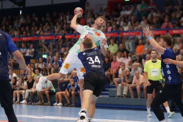 August 7, 2026, xtgx, Handball Tournament, EHV Aue vs. SC Magdeburg emspor, from left: Philipp Weber (Magdeburg), 20 shots on goal, goal scorer, scores a goal, goal, scores the goal Lößnitz