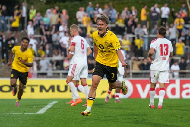 Friday, August 7, 2026 2026–2027 Season, Matchday 2 of the Regionalliga West at Rote Erde Stadium, Dortmund, Germany BV Borussia Dortmund U23 vs. 1. FC Köln U21 Fans celebrate after Tim Degener scores the 1–0 goal for BVB