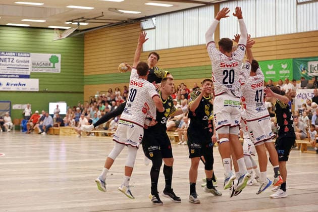 August 7, 2026, xovx, Lindencup Handball Tournament, TV Hüttenberg vs. HSC 2000 Coburg; Paul Ohl (TV Hüttenberg), Sven Wesseling (HSC Coburg), Nils Röller, HSC Coburg; Leonards Valkovskis, HSC Coburg; Leif Haack, TV Hüttenberg; Danil Dyatlov, TV Hüttenberg; Jesper Schartl, HSC Coburg; Linden City Hall, Hesse, Germany, DE