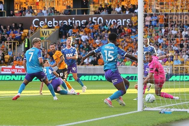 Adam Armstrong of Wolves scores their sides first goal Wolverhampton Wanderers v Port Vale, EFL Carabao Cup, First Round, Football, Molineux, Wolverhampton, UK - 07 Aug 2026Wolverhampton Molineux United Kingdom EDITORIAL USE ONLY No use with unauthorised audio, video, data, fixture lists, club league logos or live services. Online in-match use limited to 120 images, no video emulation. No use in betting, games or single club league player publications. Copyright: xPhilxOldham Shutterstockx 17050839ab