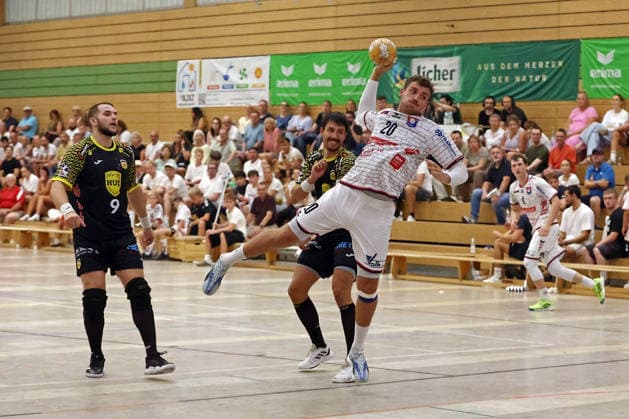 August 7, 2026, xovx, Lindencup Handball Tournament, TV Hüttenberg vs. HSC 2000 Coburg; Bartlomiej Bis (HSC Coburg), Nejc Planinsek (HSC Coburg), Leif Haack (TV Hüttenberg); Linden City Hall, Hesse, Germany, DE
