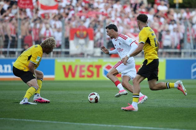 August 7, 2026, xsefx, Soccer, Borussia Dortmund II U23 vs. 1. FC Köln II U21, Regionalliga West, Rote Erde Stadium, Matchday 2, 2026–2027 season: Malek El Mala (1. FC Köln II 07) against two BVB II players—Jesper Verlaat (BVB II 04) and Malik Hodroj (BVB II 23). DFB regulations prohibit any use of photographs as image sequences and or quasi-video. North Rhine-Westphalia, Germany