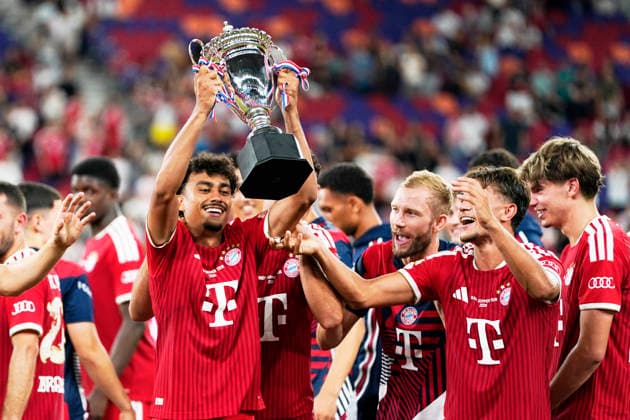HONGKONG-SOCCER Nathaniel Brown of FC Bayern Munich holding a trophy after a match of FC Bayern Munich VS Aston Villa at Kai Tak Stadium during the Audi Football Summit 2026 in Hong Kong, August 7, 2026. NEXPHER Vernon Yuen HONG KONG