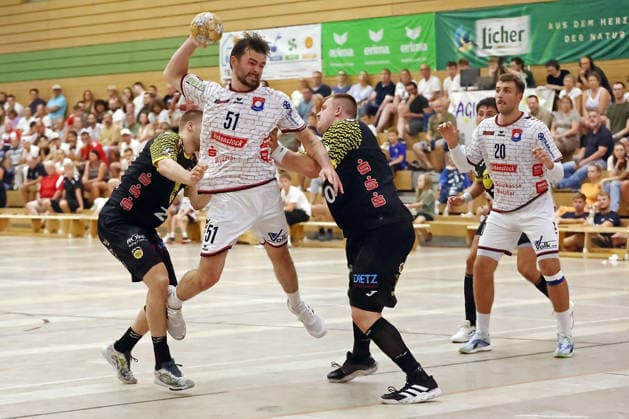August 7, 2026, xovx, Lindencup Handball Tournament, TV Hüttenberg vs. HSC 2000 Coburg, Leonards Valkovskis (HSC Coburg), Hendrik Schreiber (TV Hüttenberg), Nils Röller (HSC Coburg), Jannes Krone, HSC Coburg; Leif Haack, TV Hüttenberg; Linden Stadthalle, Hesse, Germany, DE
