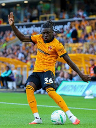 WOLVERHAMPTON, ENGLAND - August 7: Mateus Mane of Wolves crosses the ball during the Carabao Cup football match between Wolverhampton Wanderers and Port Vale at Molineux stadium on August 7 2026 in Wolverhampton, England Copyright: xNataliexMincher SPPx Sportspressphoto_SPR202173