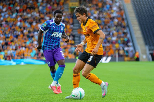 WOLVERHAMPTON, ENGLAND - August 7: Hugo Bueno of Wolves on the ball during the Carabao Cup football match between Wolverhampton Wanderers and Port Vale at Molineux stadium on August 7 2026 in Wolverhampton, England Copyright: xNataliexMincher SPPx Sportspressphoto_SPR202178