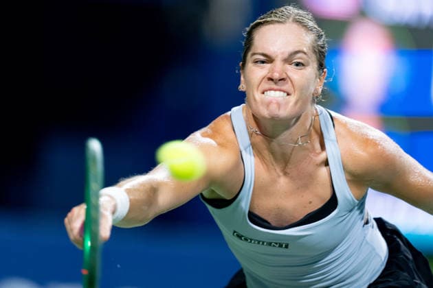 TORONTO, ON - AUGUST 07: Caty McNally of the United States returns a shot during her match at the WTA, Tennis Damen National Bank Open tournament on August 7, 2026 at Sobeys Stadium in Toronto, ON, Canada (Photo by Julian Avram Icon Sportswire) TENNIS: AUG 07 National Bank Open EDITORIAL USE ONLY Icon2608071649
