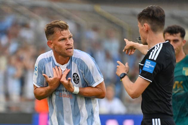 Florian NIEDERLECHNER of TSV 1860 Munich complains to referee Johannes WAGNER during the 2026–2027 Bavarian Regional League soccer season,Matchday 26–27, Game 3: TSV 1860 Munich vs. FC Augsburg II (2–2) on August 7, 2026, at Grünwalder Stadion in Munich