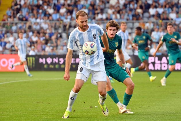 Michael EBERWEIN 1860 Munich 4, Action, Tackle against David LICHTENSTEIGER A, Bavarian Regional League Soccer Season 2026–2027, Matchday 26–27, Game 3: TSV 1860 Munich vs. FC Augsburg II on August 7, 2026, at Grünwalder Stadion in Munich