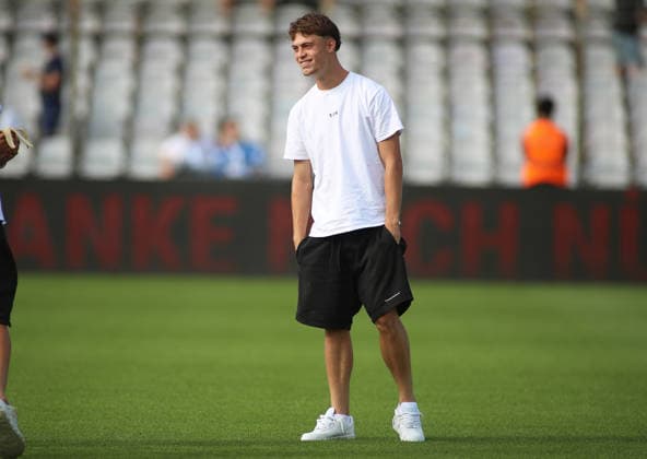 Soccer, Men s, Bavarian Regional League, 2026–2027 Season, TSV 1860 Munich vs. FC Augsburg II, Grünwalder Stadium: Emre Erdogan of TSV 1860 Munich in good spirits during the pre-game field inspection