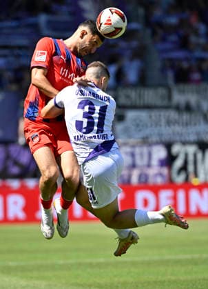 Heading duel, tackle, action: Patrick Kammerbauer (VfL Osnabrück 31) vs. Marcel Costly (1. FC Heidenheim 1846 FCH 24), 1. FC Heidenheim 1846 FCH vs. VfL Osnabrück, August 8, 2026 DFL regulations prohibit any use of photographs as image sequences and or quasi-video. 1 FC Heidenheim 1846 FCH vs. VfL Osnabrück