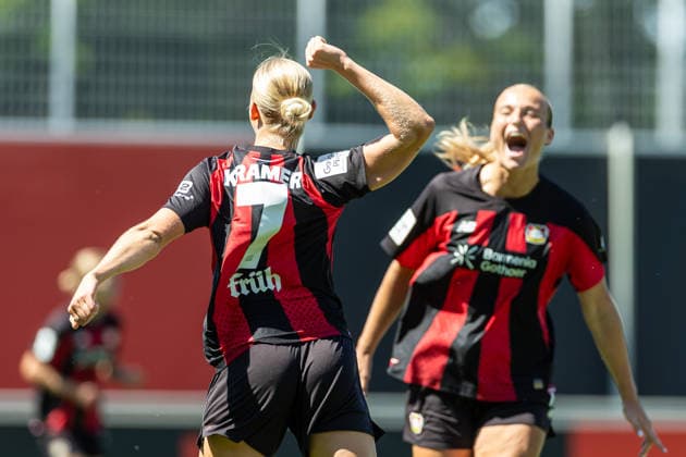 Cornelia Kramer of Bayer 04 Leverkusen celebrates a goal with her team after scoring the 1-0 goal during the friendly match between the Bayer 04 Leverkusen women s team and the Feyenoord Rotterdam women s team, Ulrich Haberland Stadium on August 8, 2026, in Leverkusen, Germany. Photo by Mario Hommes, DeFodi Images. Cornelia Kramer of Bayer 04 Leverkusen celebrates with her teammates after scoring her team’s first goal during the preseason friendly match between Bayer 04 Leverkusen Women and Feyenoord Rotterdam Women at Ulrich Haberland Stadium on August 8, 2026 in Leverkusen, Germany. Photo by Mario Hommes, DeFodi Images