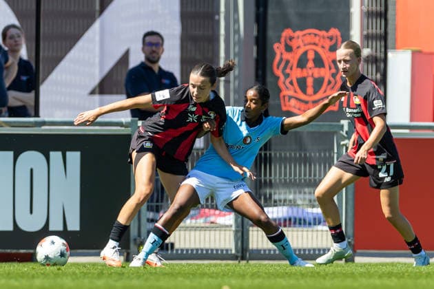 Carlotta Wamser of Bayer 04 Leverkusen and Victoria Della Peruta of Feyenoord Rotterdam battle for the ball during the preseason friendly match between the Bayer 04 Leverkusen women’s team and the Feyenoord Rotterdam women’s team at Ulrich Haberland Stadium on August 8, 2026, in Leverkusen, Germany. Photo by Mario Hommes, DeFodi Images. Carlotta Wamser of Bayer 04 Leverkusen and Victoria Della Peruta of Feyenoord Rotterdam battle for the ball during the preseason friendly match between Bayer 04 Leverkusen Women and Feyenoord Rotterdam Women at Ulrich Haberland Stadium on August 8, 2026 in Leverkusen, Germany Photo by Mario Hommes DeFodi Images