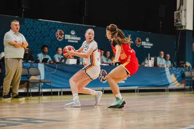 A German player drives the ball forward in a one-on-one situation against a Montenegrin defender. The scene takes place at the U18 EuroBasket Women at Kistamässan in Stockholm. Germany faces Montenegro in a head-to-head matchup at the U18 EuroBasket in Stockholm. Copyright: xJoelxKruehlerx