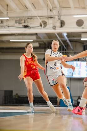 Darina Zraychenko 8 of Germany beats out a Montenegrin player in a one-on-one battle and drives toward the basket. The scene shows intense physical contact on the court at Kistamässan in Stockholm. Darina Zraychenko 8 of Germany in a one-on-one battle against Montenegro Copyright: xJoelxKruehlerx