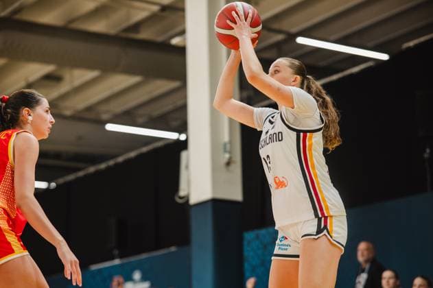 Mia Wiegand (No. 13) of Germany drives up the court with the ball to take a shot, while a Montenegrin player watches the play. The scene takes place at the Kistamässan in Stockholm. Mia Wiegand (No. 13) of Germany attempts a shot against Montenegro. Copyright: xJoelxKruehlerx