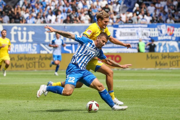 August 8, 2026, xgox, Soccer 2. Bundesliga 1 FC Magdeburg vs. Eintracht Braunschweig emspor, from left: Mateusz Zukowski (Magdeburg), 22, Lukas Frenkert, Braunschweig, 29, tackle, duel, battle, DFL DFB REGULATIONS PROHIBIT ANY USE OF PHOTOGRAPHS AS IMAGE SEQUENCES AND OR QUASI-VIDEO, Magdeburg