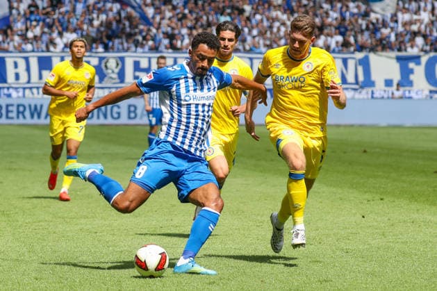 August 8, 2026, xgox, Soccer 2. Bundesliga 1 FC Magdeburg vs. Eintracht Braunschweig emspor, from left: Emmanuel Iyoha (Magdeburg), 8, Florian Flick (Braunschweig), 6: Tackle, duel, battle, DFL DFB REGULATIONS PROHIBIT ANY USE OF PHOTOGRAPHS AS IMAGE SEQUENCES AND OR QUASI-VIDEO Magdeburg